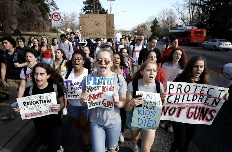 Photograph of children taking part in anti-gun protest